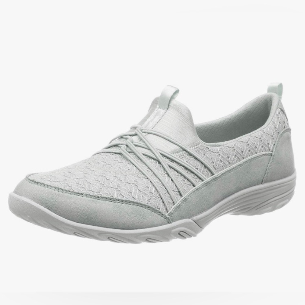 Skechers Empress Wide-Awake sneaker. Fabric/textile upper. Rubber sole.
